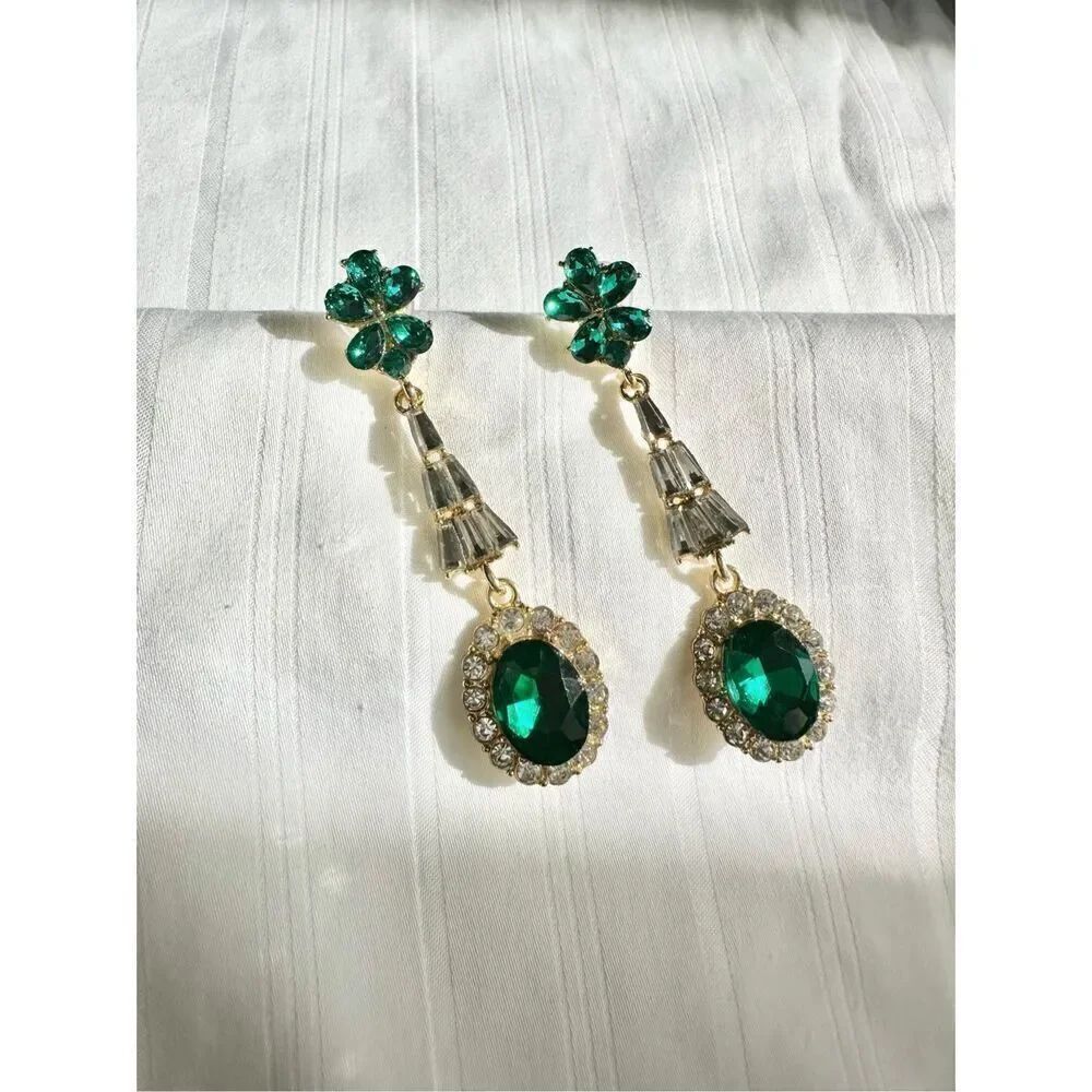 Emerald green dangle pear and oval cut earrings